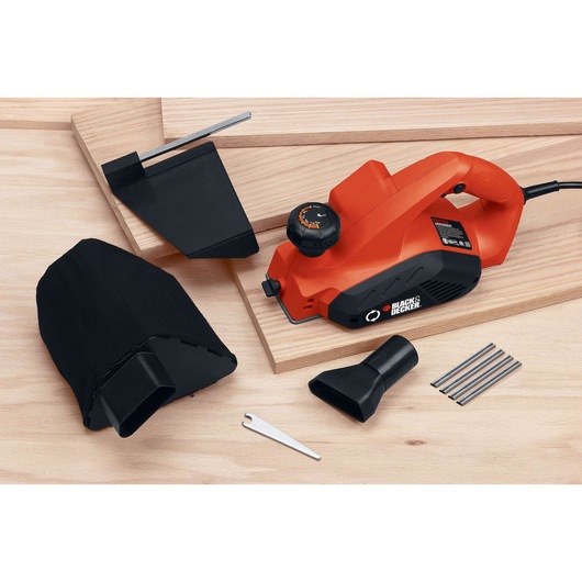 BLACKDECKER 7698K electric hand planer with accessories and wood boards, top view, on white background.