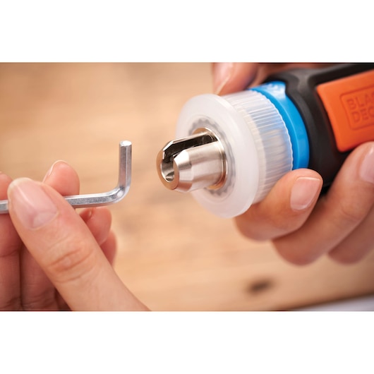 BLACKDECKER BCRTA601I rotary tool close-up with hex key, orange and blue accents, handheld.