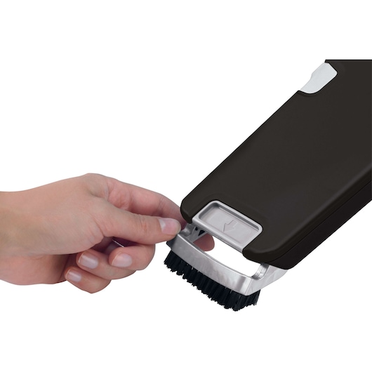 BLACKDECKER BDH2000PL handheld vacuum cleaner with extendable brush attachment being adjusted by hand, side angle.