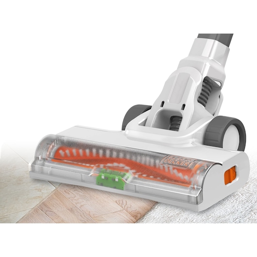 BLACK+DECKER BHFEA520J vacuum cleaner head with orange brush, cleaning hardwood and carpet, front angle.