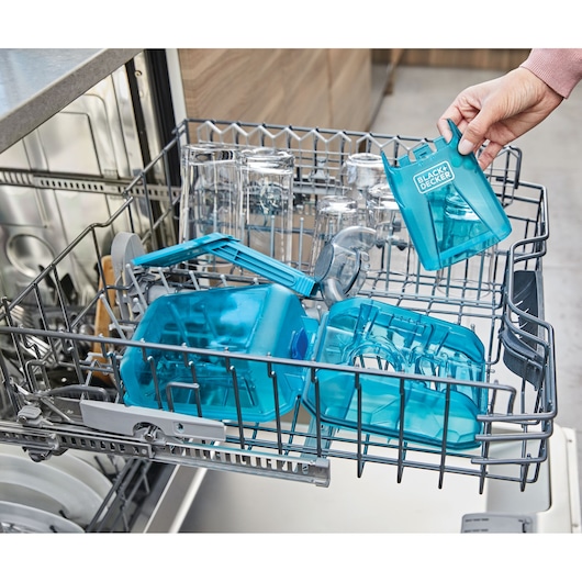 BLACKDECKER BHSB320JP vacuum parts in blue plastic placed in a dishwasher upper rack, photo from above.