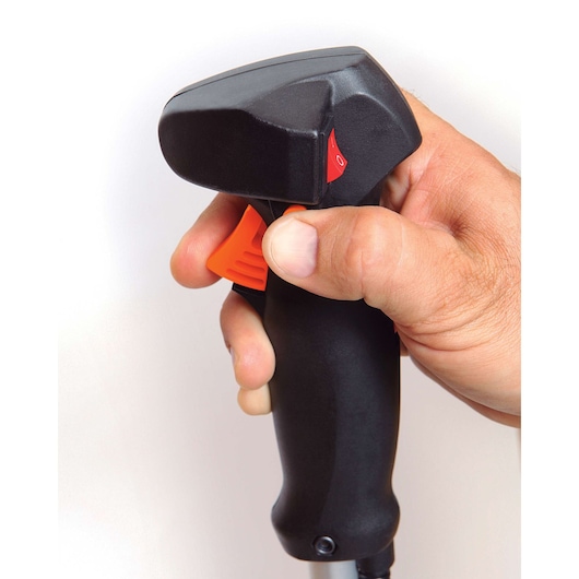 BLACKDECKER GST33 trimmer handle close-up with orange trigger and red switch held in hand, white background.